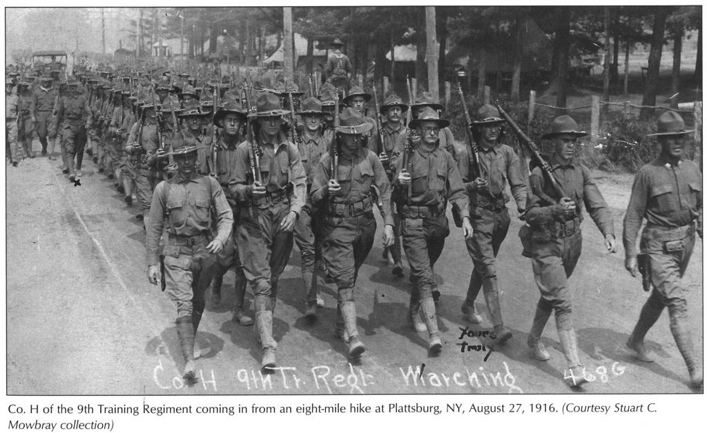 Troops marching with M1903 rifles