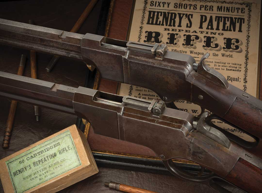 two iron frame henry rifles