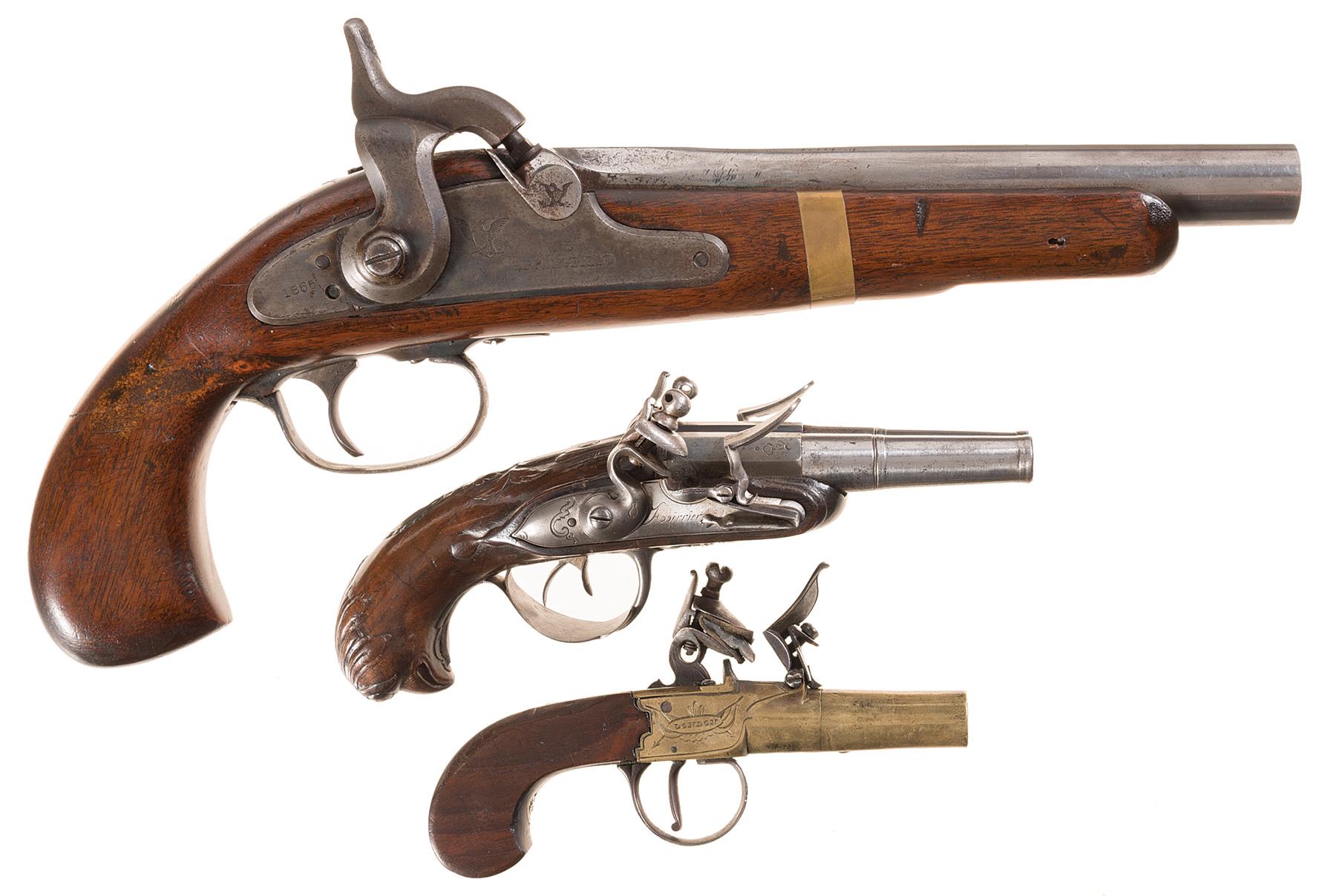 three-antique-black-powder-pistols