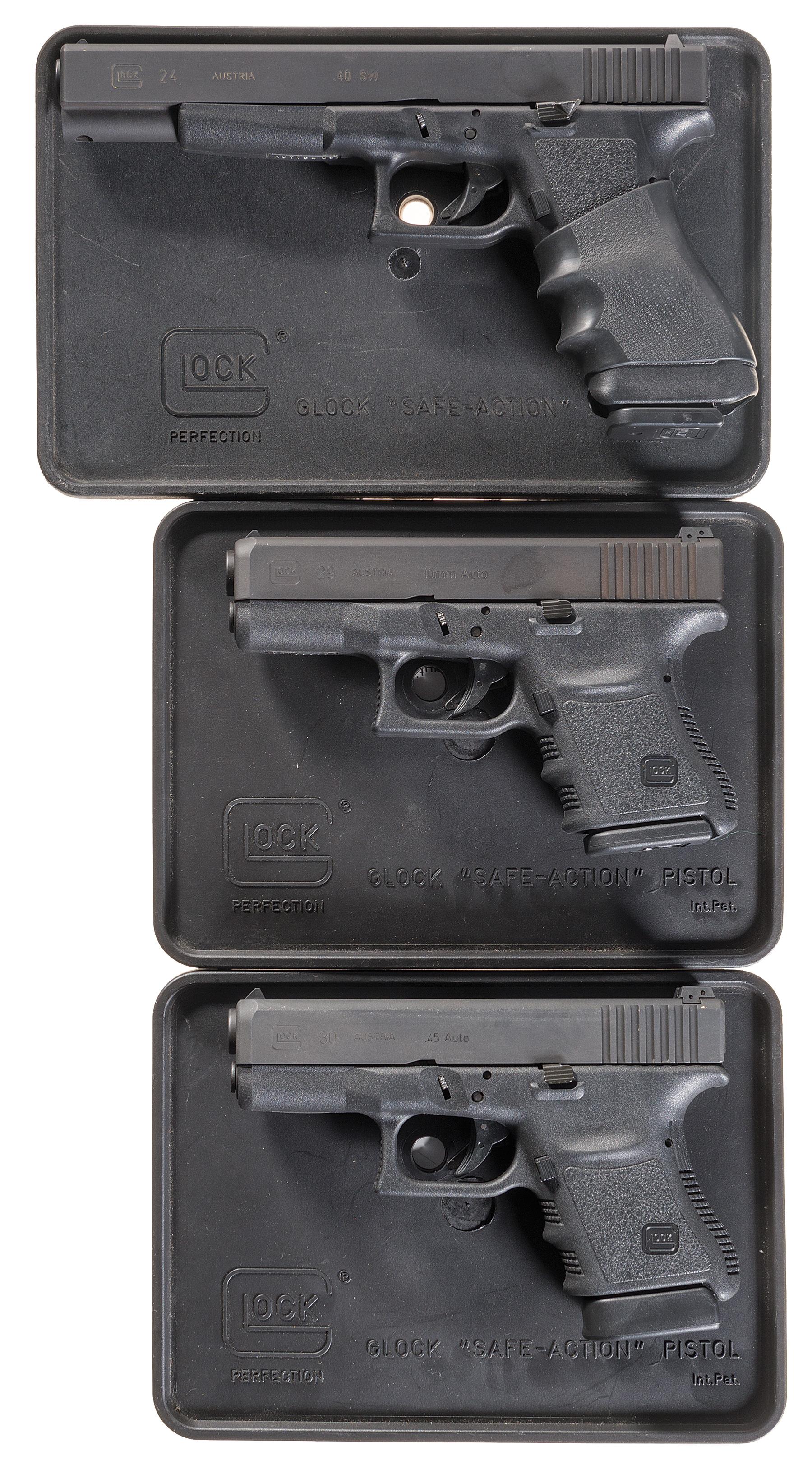 Three Glock SemiAutomatic Pistols with Cases Rock Island Auction