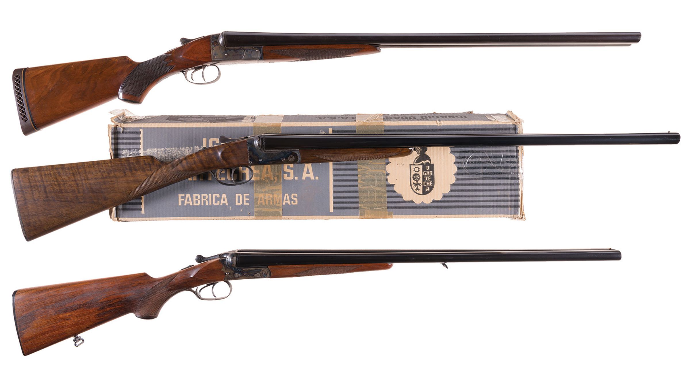 Three Engraved Double Barrel Shotguns 