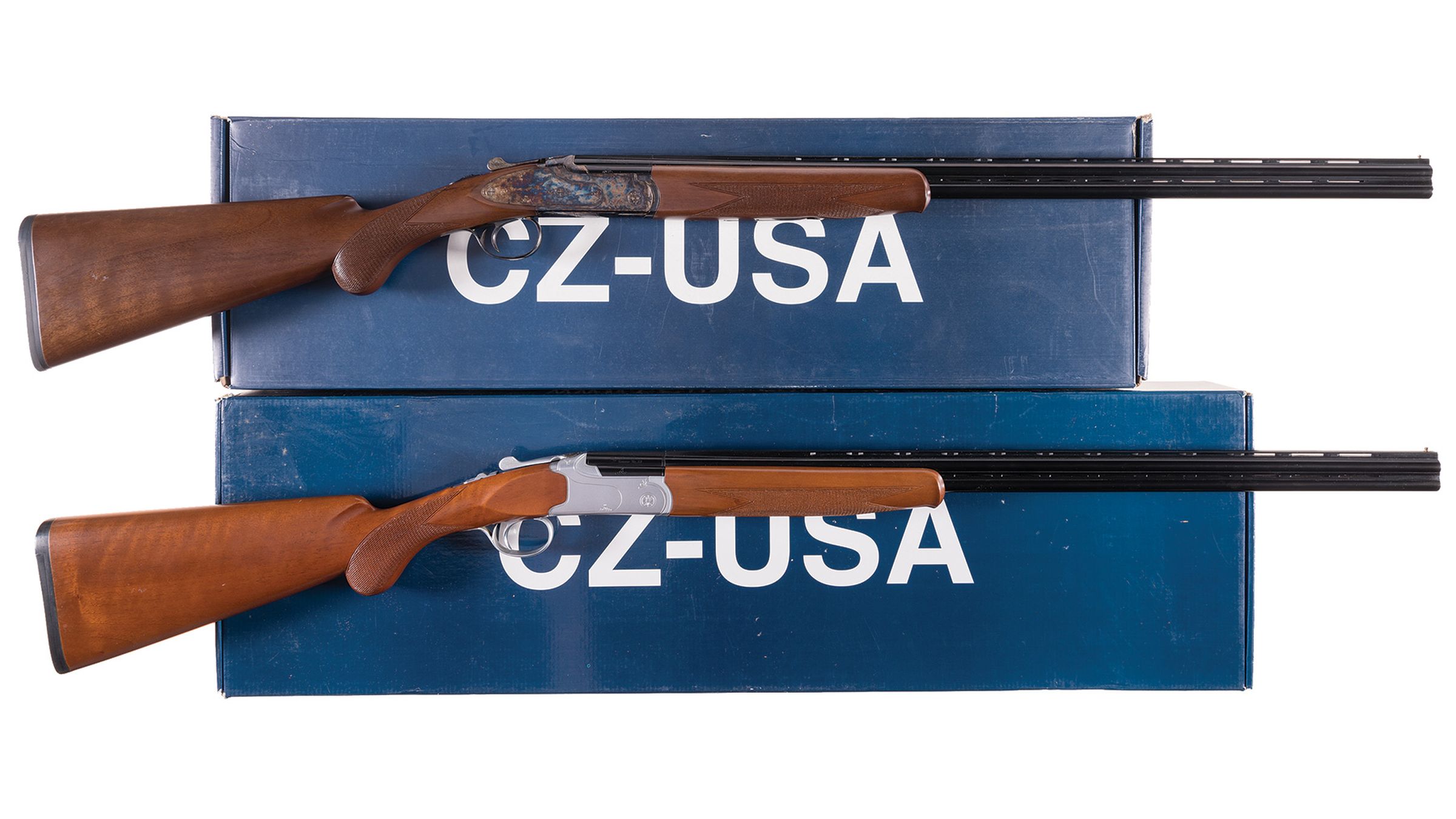 Two Boxed Engraved CZ/Huglu Over/Under Shotguns | Rock Island Auction
