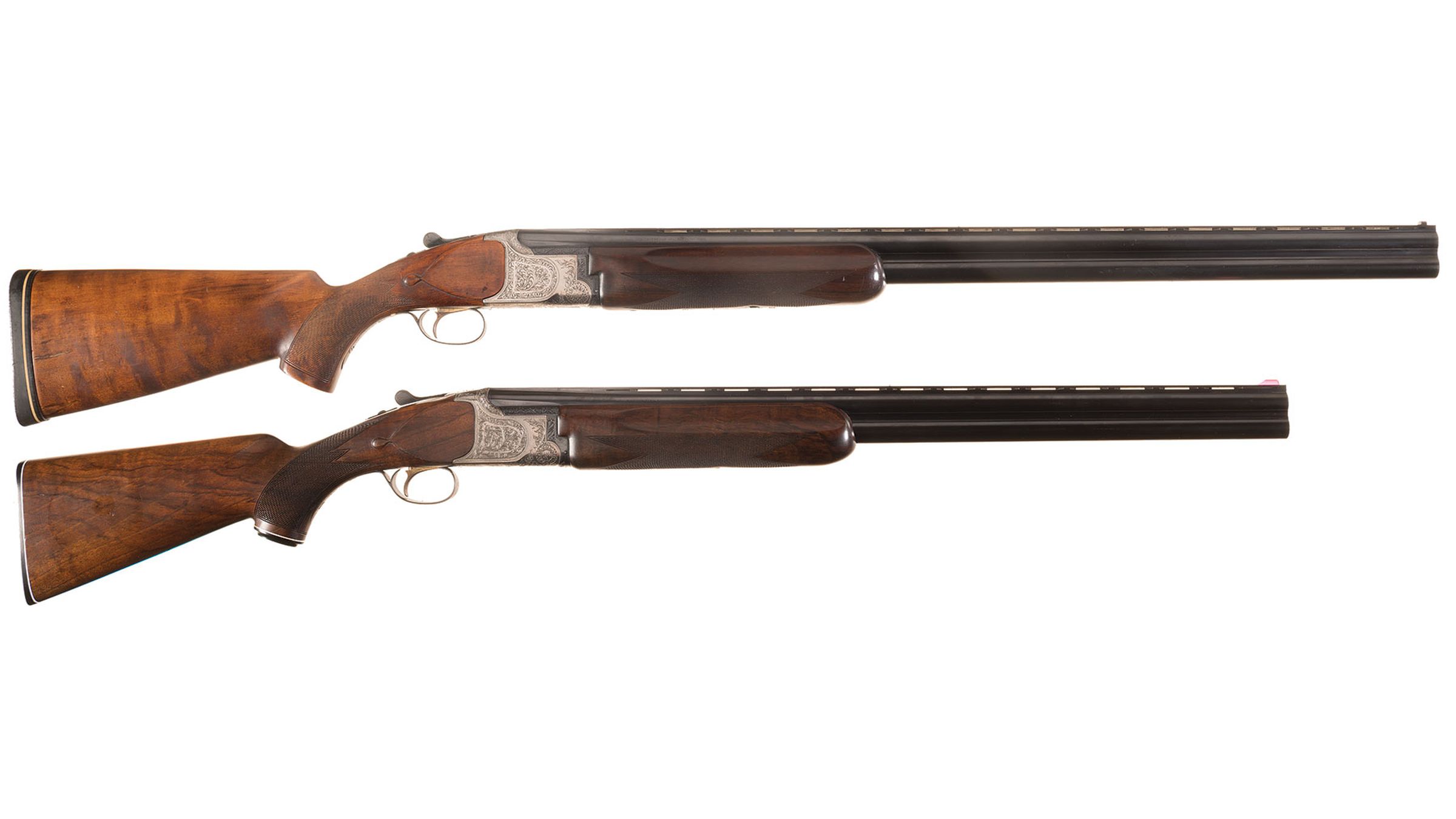 Two Engraved Over/Under Shotguns | Rock Island Auction