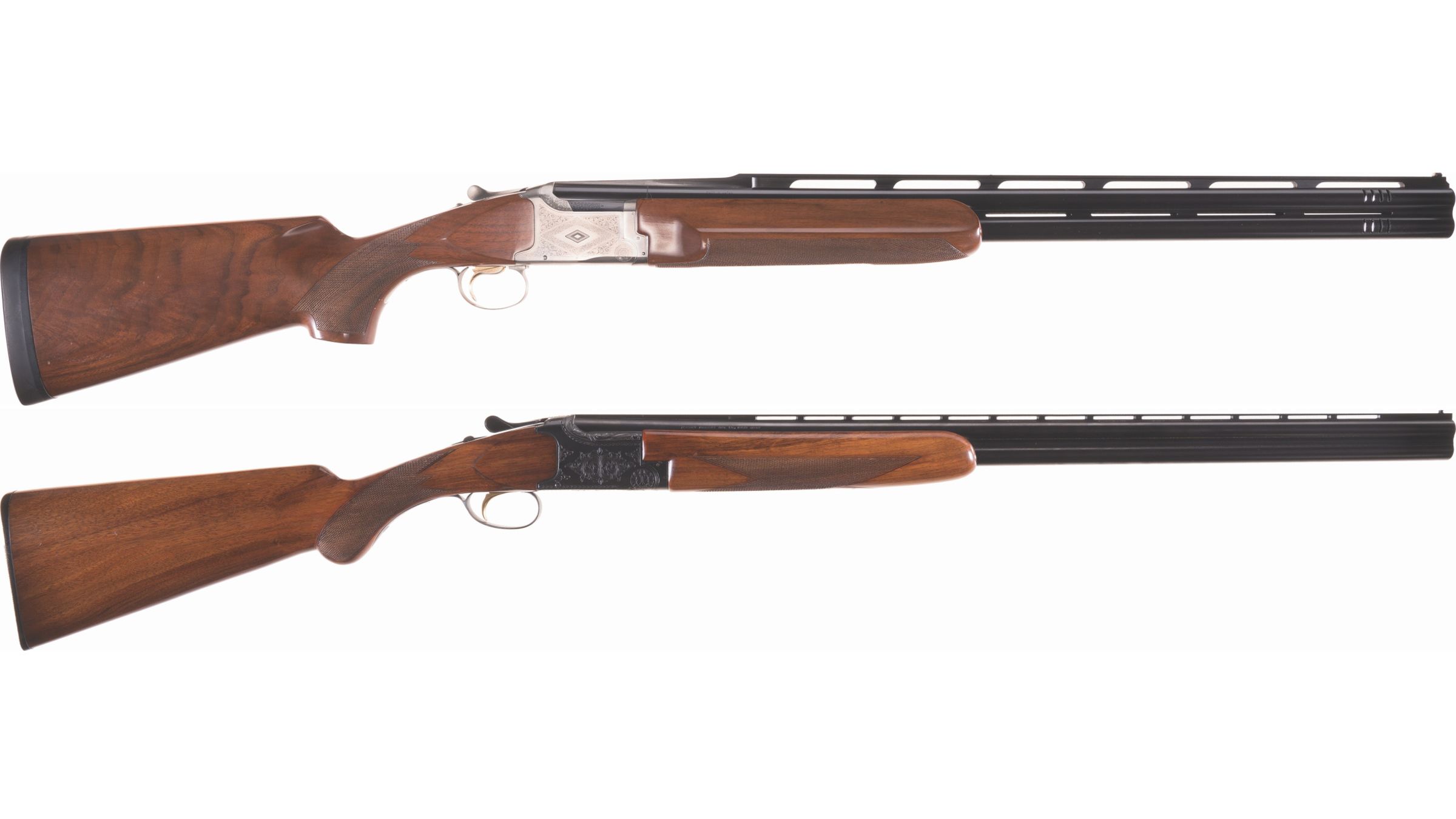 Two Engraved Over/Under Shotguns | Rock Island Auction