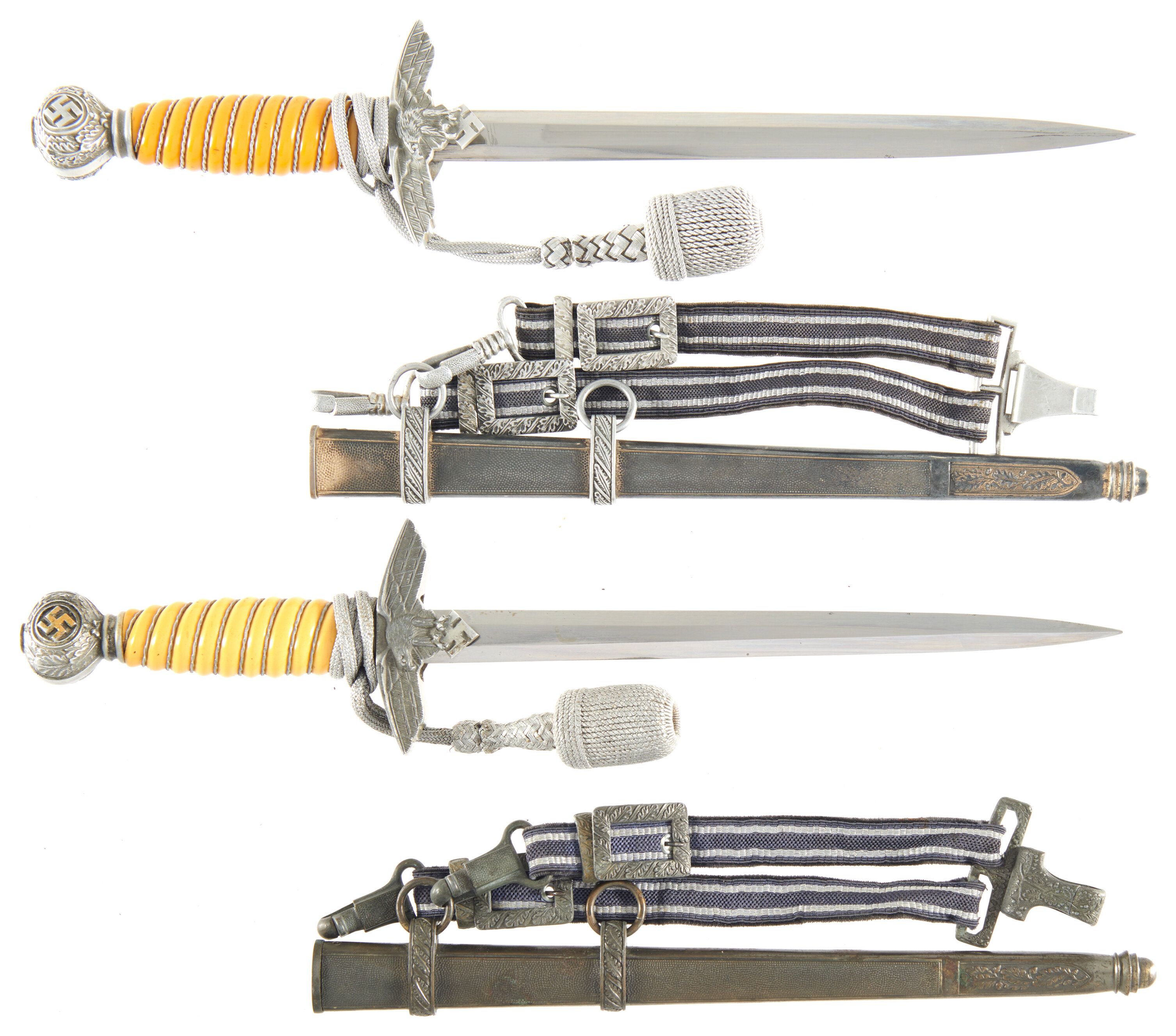 Two Luftwaffe Uniform Daggers With Scabbards 