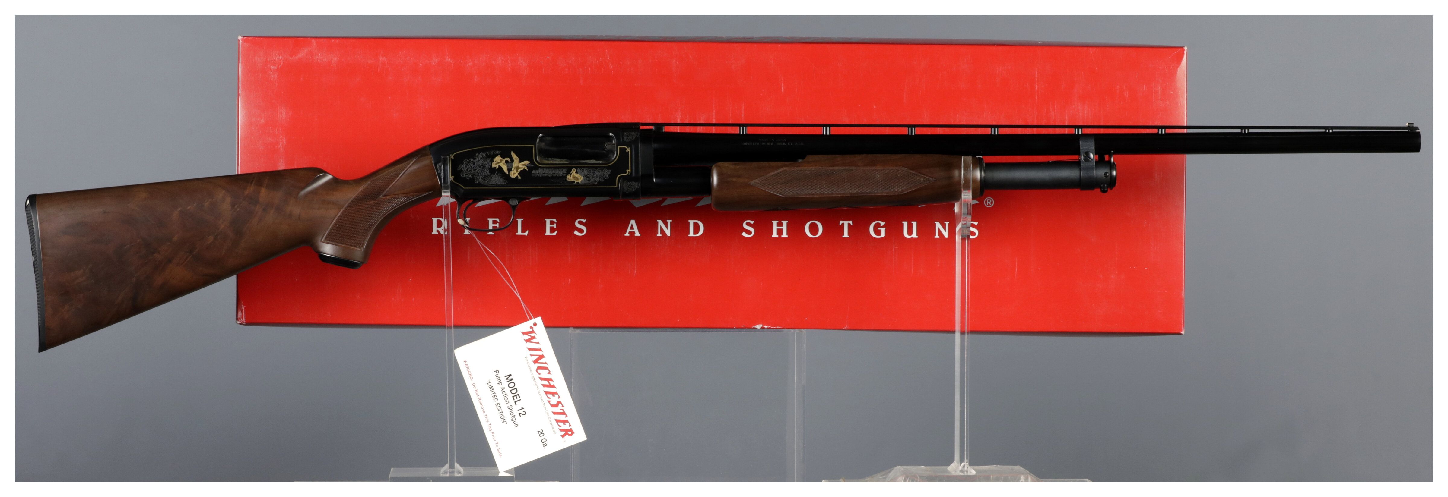 Engraved and Gold Inlaid Winchester Model 12 Shotgun | Rock Island Auction