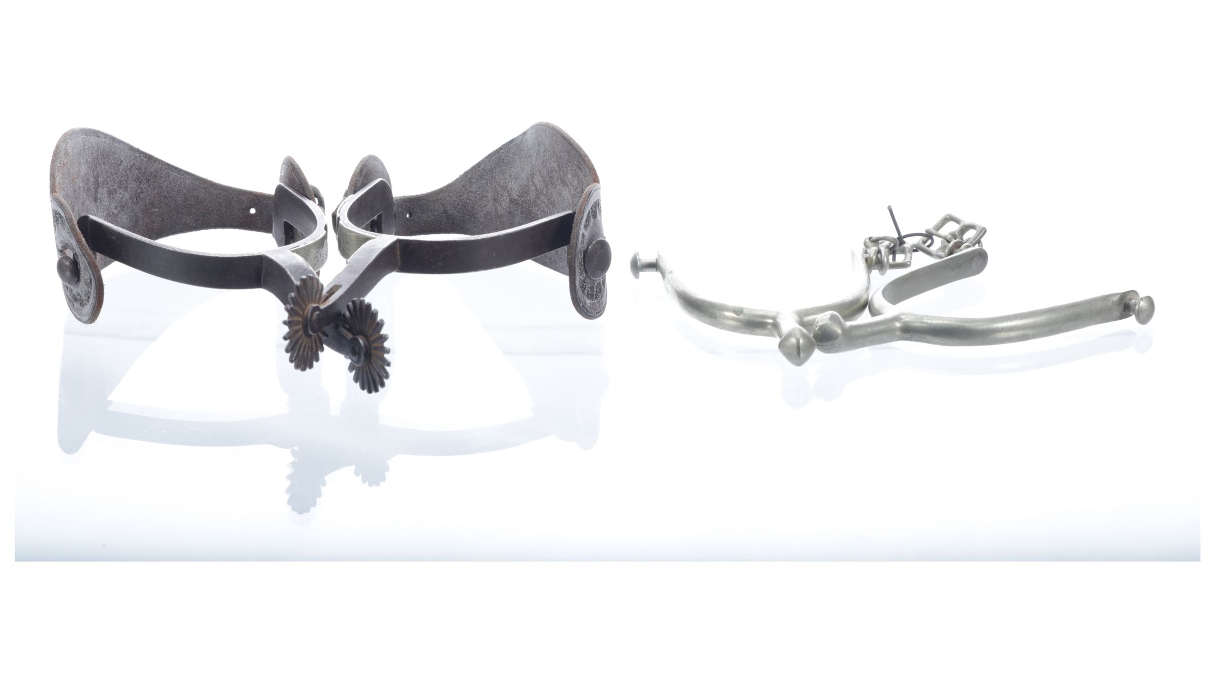 Two Pairs of Desirable August Buermann Spurs Rock Island Auction