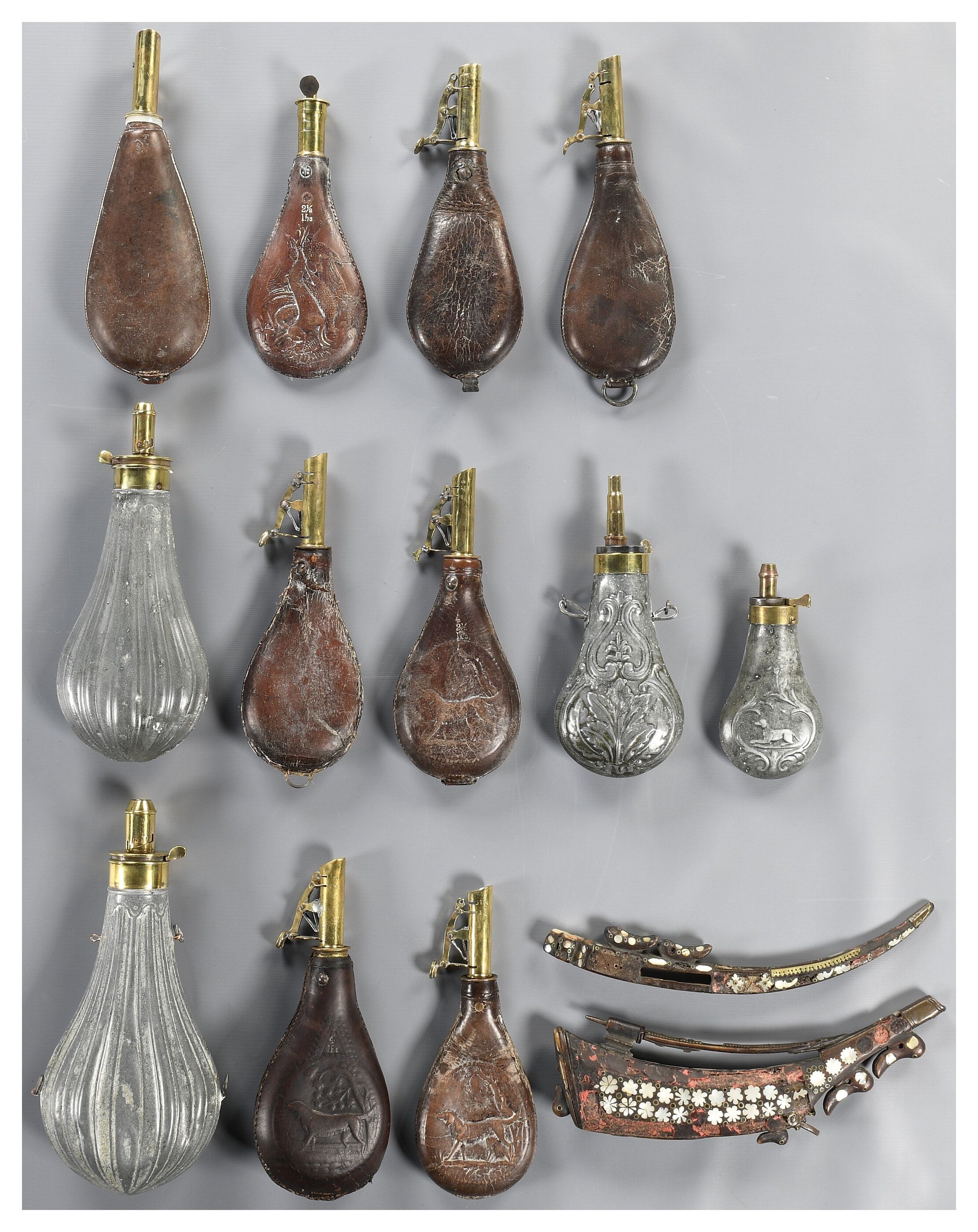 Group of Powder Flasks | Rock Island Auction