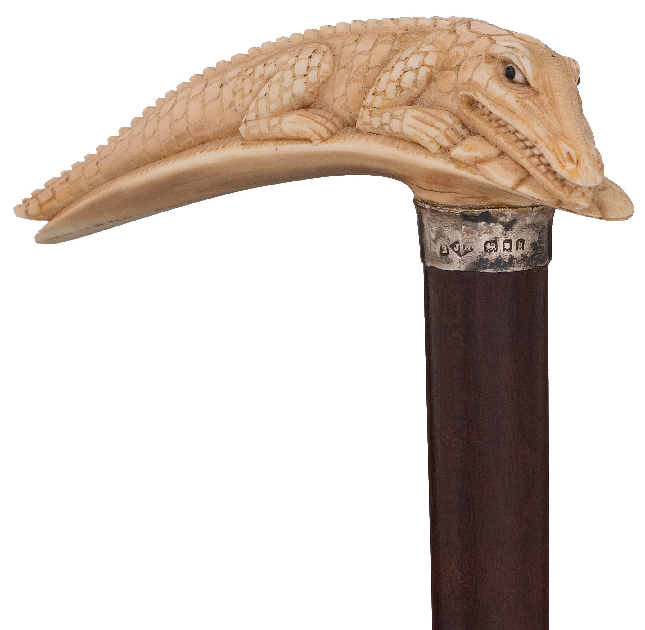 Relief Carved Crocodile Cane with Silver Band | Rock Island Auction