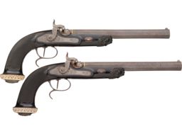 Relief Carved Pair of P.J. Malherbe Percussion Dueling Pistols