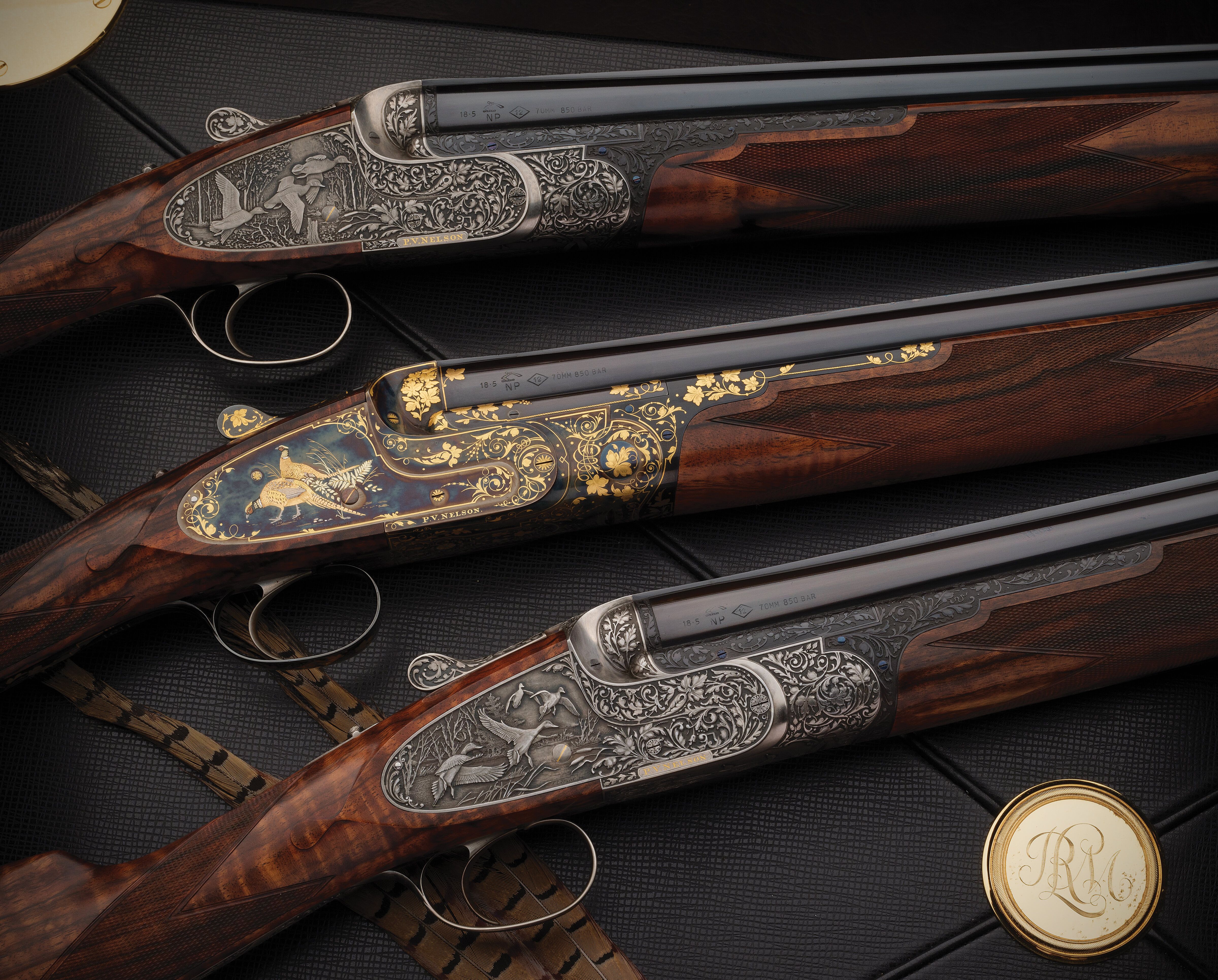 Ken Hunt Engraved Trio of P. V. Nelson Over/Under Shotguns | Rock