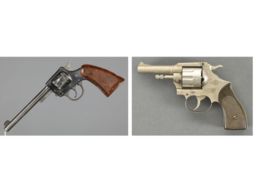 One Double Action Revolver and One Starting Pistol