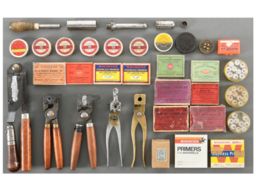 Group of Bullet Molds, Primers, and Flares