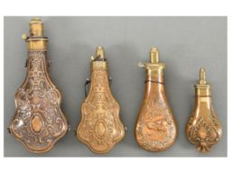 Grouping of Four Powder Flasks