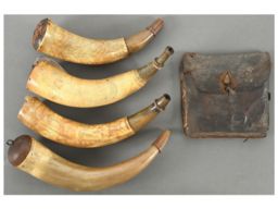 Four Engraved Powder Horns and One Leather Pouch