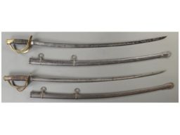 Two Civil War U.S. Model 1860 Cavalry Sabers with Scabbards