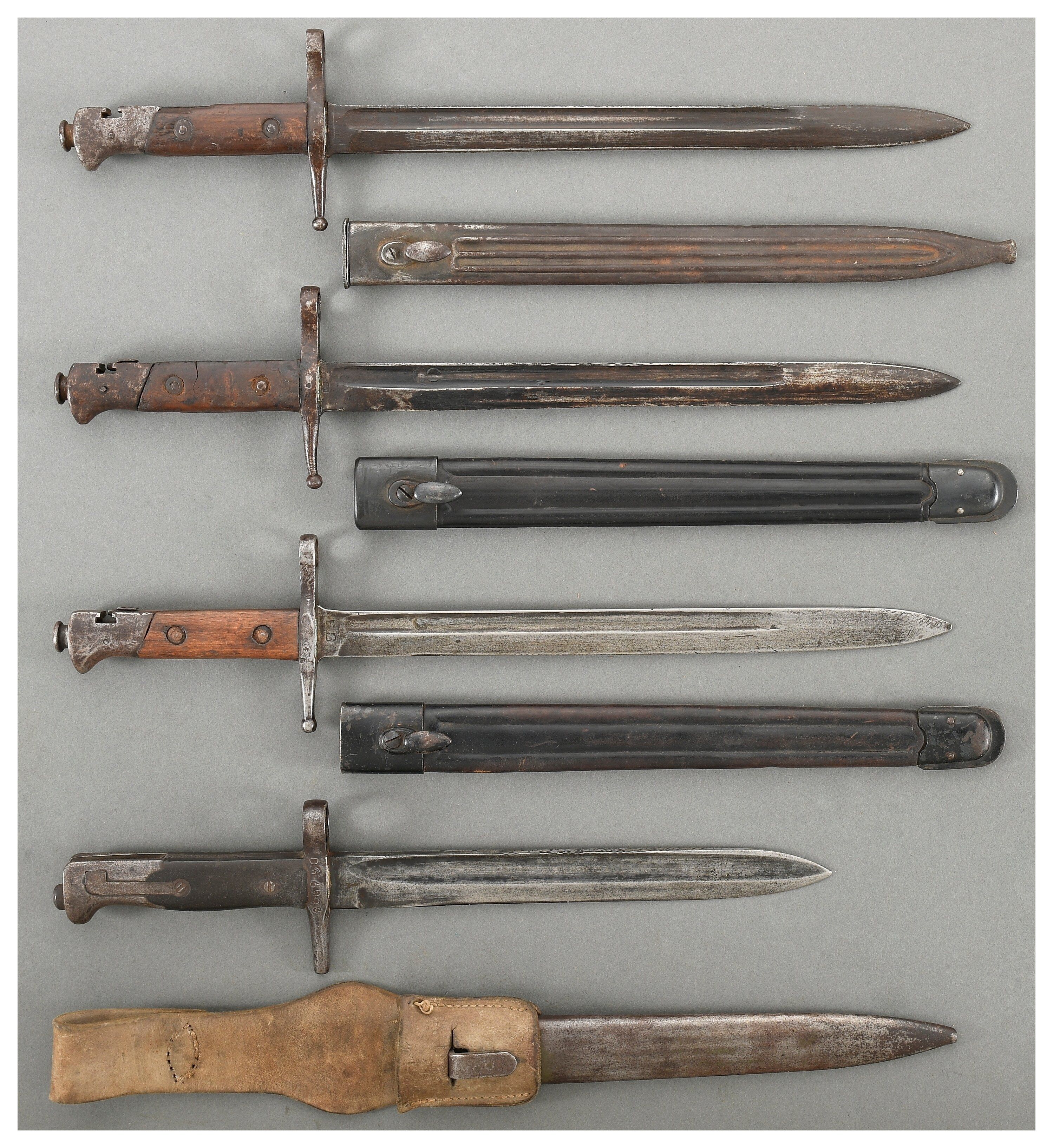 Four Italian Bayonets with Scabbards | Rock Island Auction