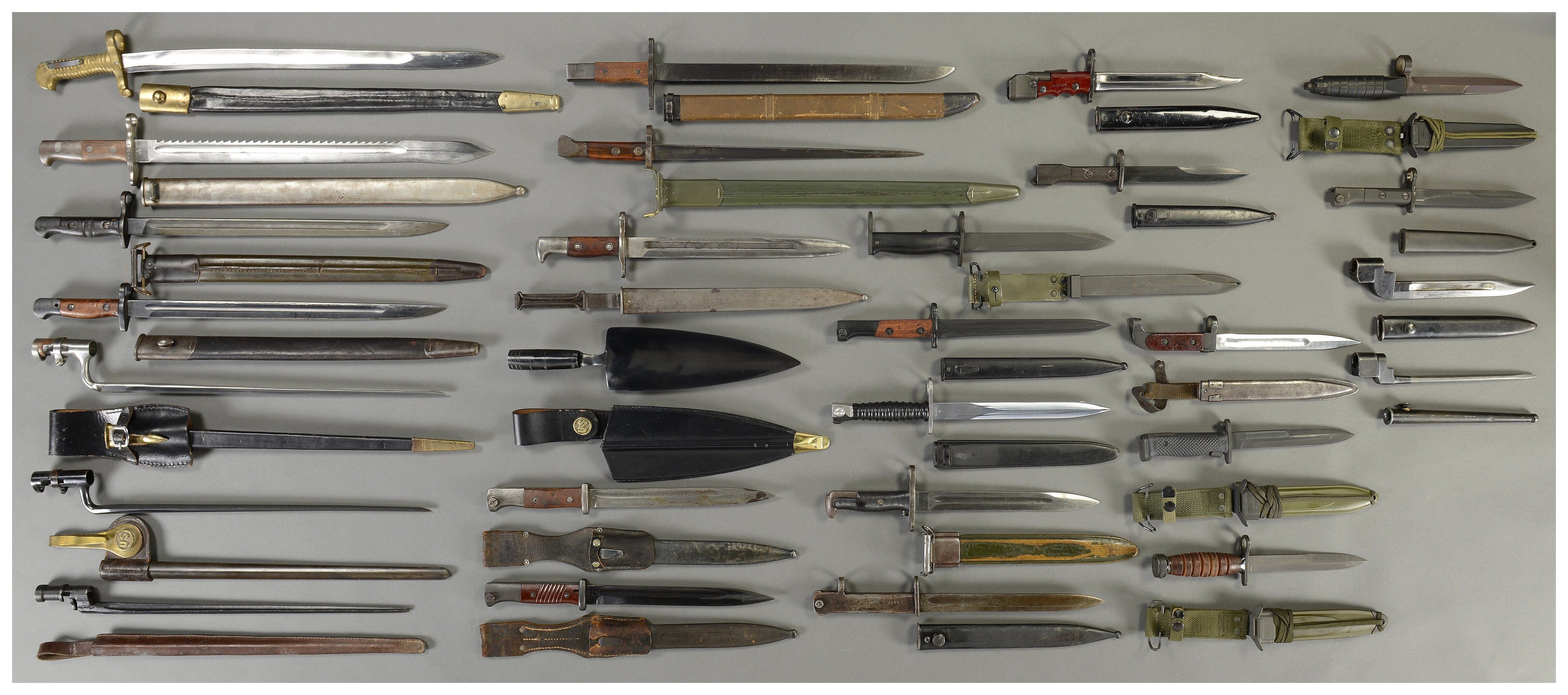 Large Assortment of Bayonets with Scabbards | Rock Island Auction