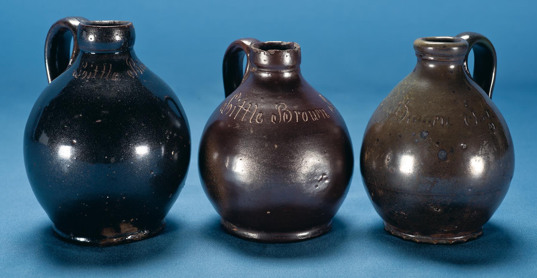 Three Little Brown Jugs by Anna Pottery Rock Island Auction