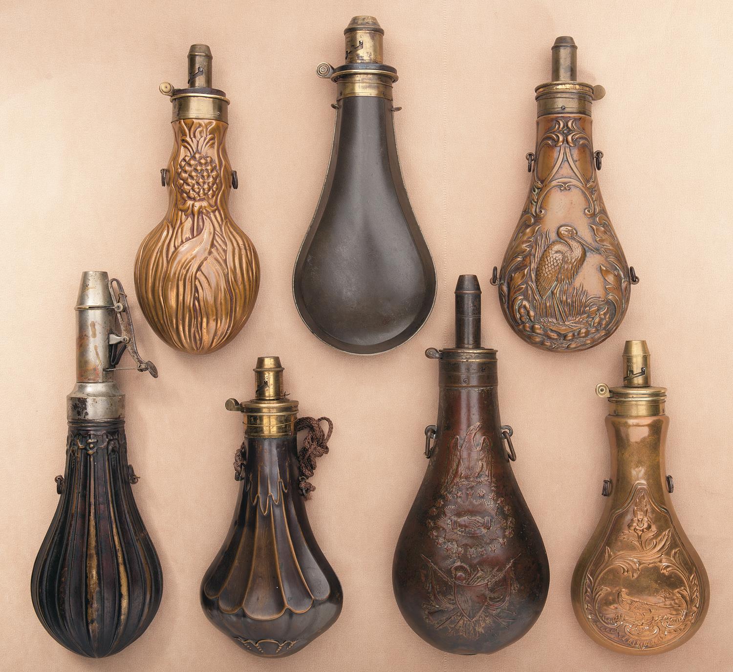 Seven Powder Flasks | Rock Island Auction