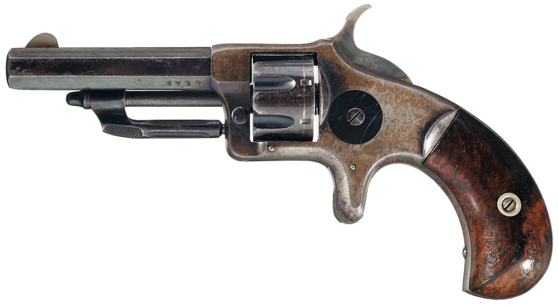 Fine Wesson & Harrington No. 2, 22 Caliber RevolverManufactured from 1874 to 1879. The upper left barrel flat has the Wesson & Harrington address and patent dates marking. The ejector rod, barrel and grips are numbered to the gun. Push type...