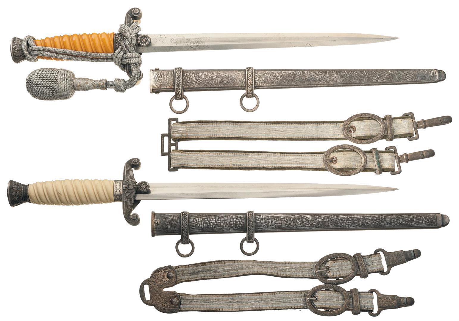 Two Nazi Heer Daggers With Scabbards And Belt Hangers 