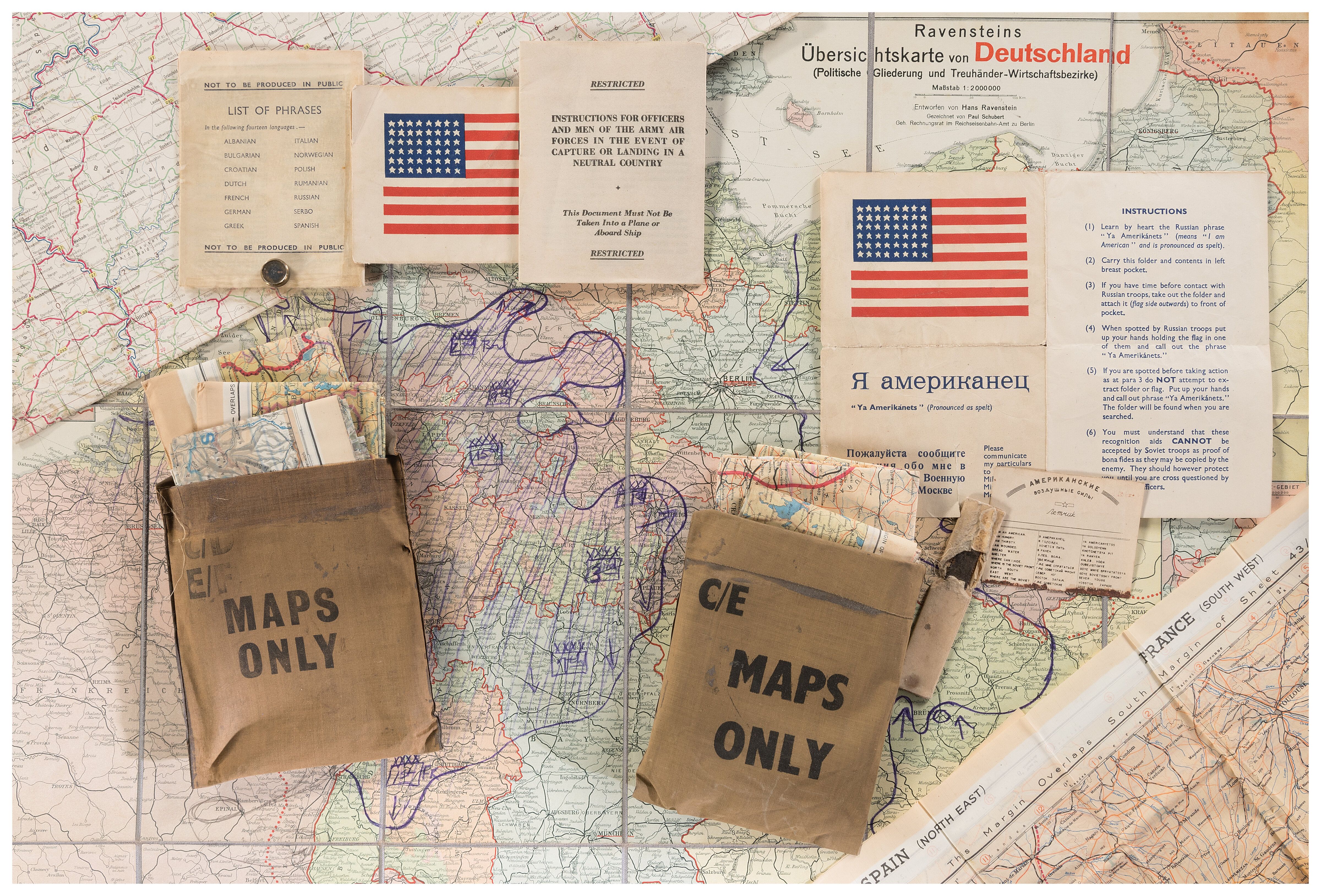 Grouping of World War II Era Maps with a Map Case | Rock Island Auction