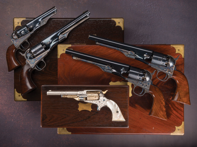 Antique pistols and their boxes