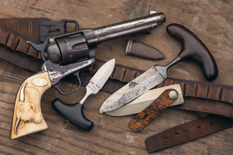 Gun belt daggers and a revolver