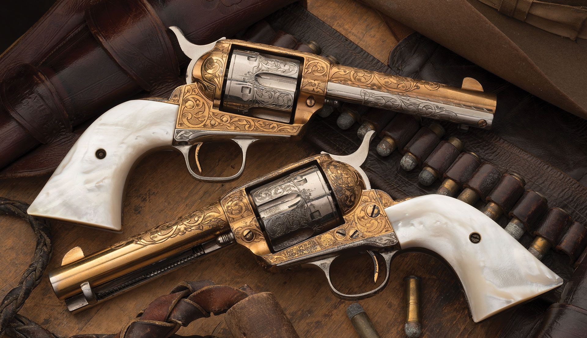 Engraved-Gold-Silver-Plated-Pair-of-Colt-SAA-Revolvers