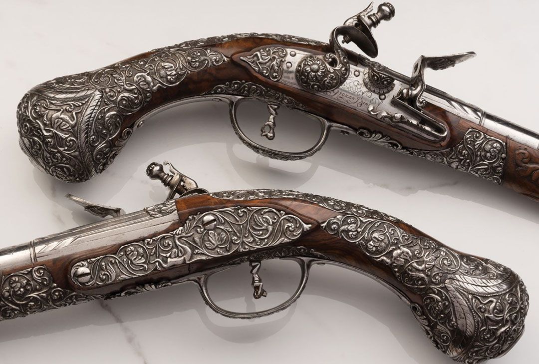 17th-century-pair-of-chiseled-brescian-flintlock-pistols