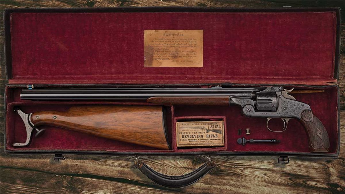 Spectacular-and-Extremely-Rare--Factory-Documented-Gustave-Young-Factory-Engraved-Smith---Wesson-Model-320-Revolving-Rifle-with-Shoulder-Stock-and-Case