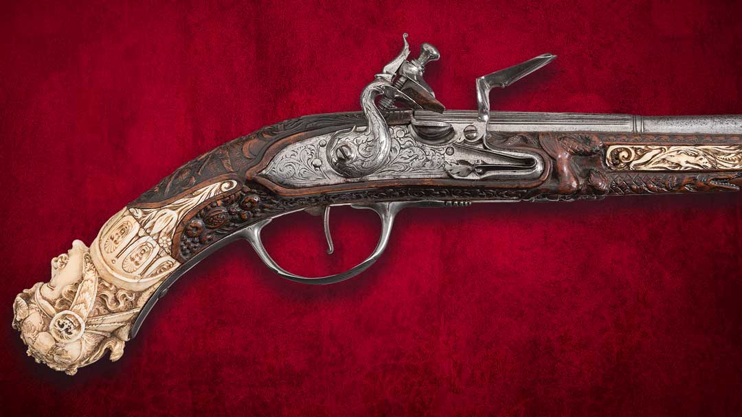 -Relief-Carved-and-Inlaid-17th-Century-Flintlock-Pistol-with-Fantastic-Carved-Bust-Pommel-Attributed-to-Master-Carver-Johann-Michael-Maucher