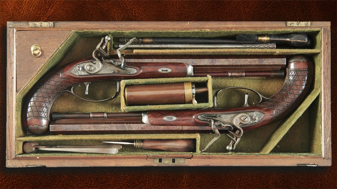 Cased pair of Durs Egg flintlock officers pistols an antique gun collection must have