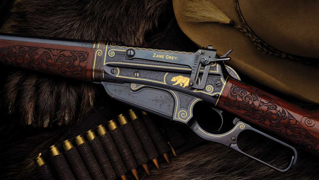 Author-Zane-Grey-and-his-engraved-Winchester-Model-1895-rifle-1