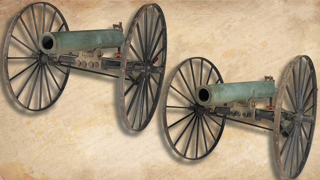 Two-Dahlgren-12-Pound-Bronze-Boat-Howitzers-with-Iron-Carriages