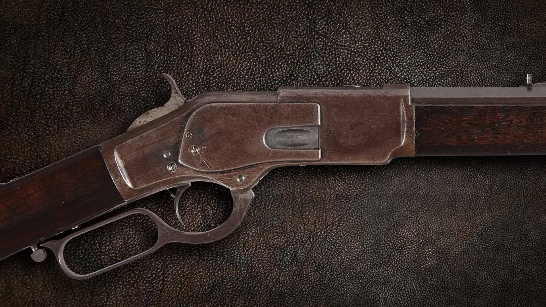 1874-Production-Winchester-First-Model-1873-Lever-Action-Rifle-with-Raised-Thumbprint-Dust-Cover