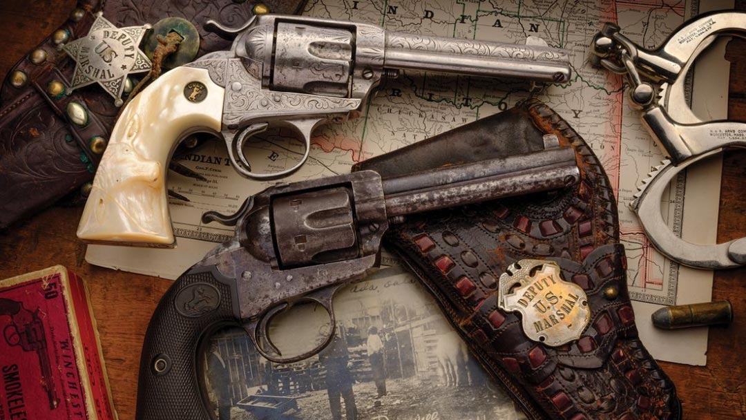 Pair-of-Colt-Bisley-Single-Action-Army-Revolvers-with-Holsters-owned-by-a-US-Marshal-who-served-with-Bass-Reeves