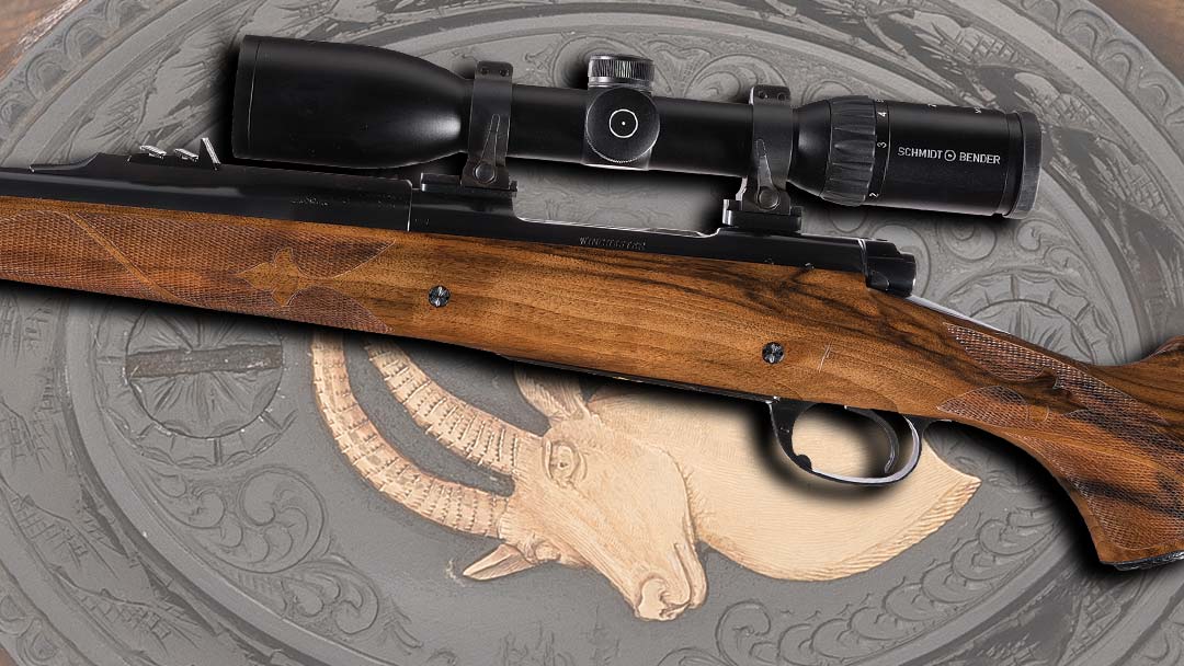 H.-L.-Pete-Grisel-Gunmaker-Upgraded-Game-Scene-Engraved-and-Gold-Inlaid-Pre64-Winchester-Model-70-Bolt-Action-Rifle-in-375-Holland-and-Holland-Magnum-with-Schmidt-and-Bender-Scope