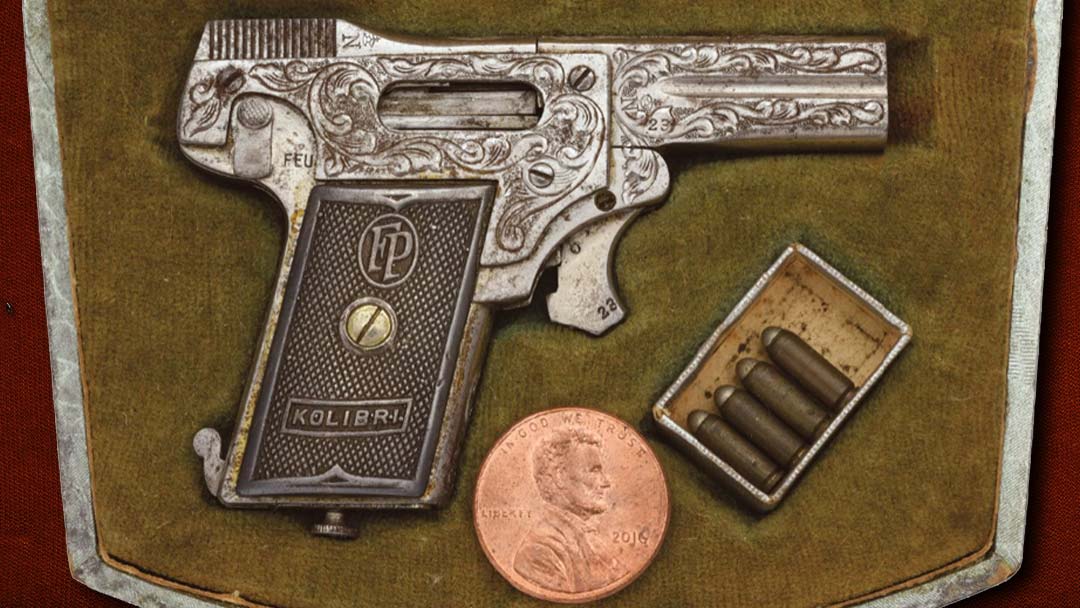 engraved-pfannl-kolibri-pistol-with-metal-grips-and-case