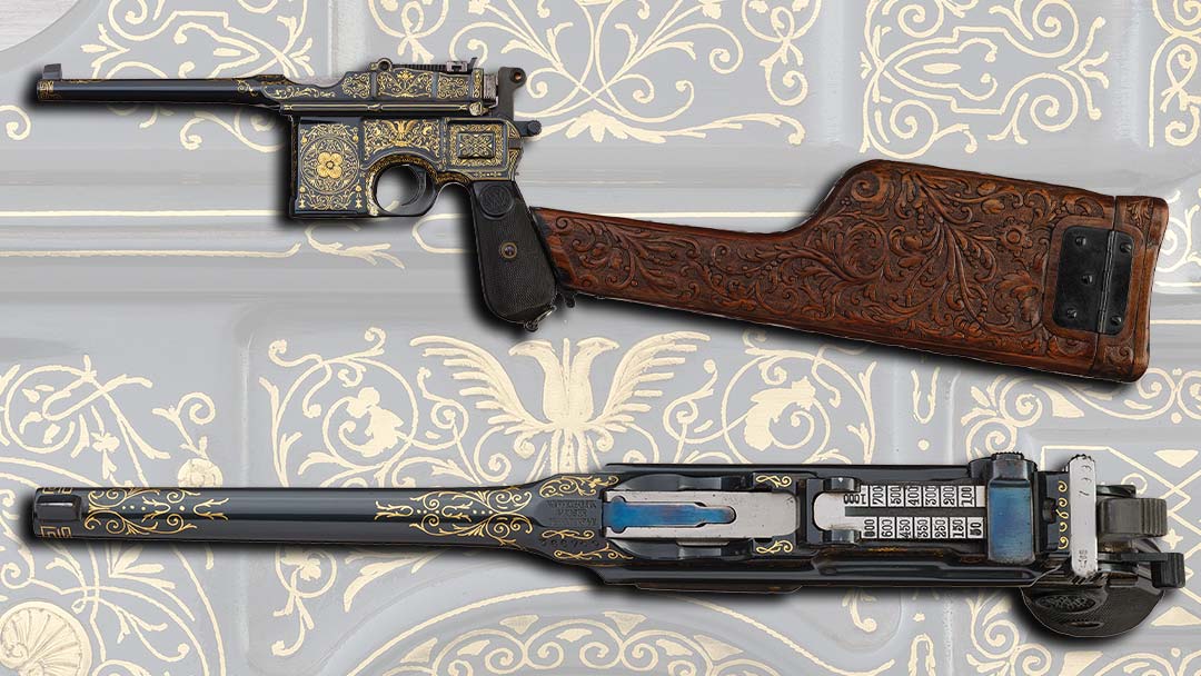 engraved-gold-inlaid-mauser-broomhandle-pistol-with-carved-stock