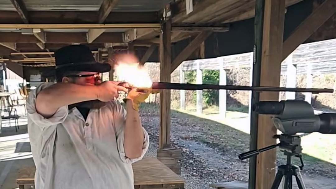 Black-Powder-Therapist-fires-a-flintlock