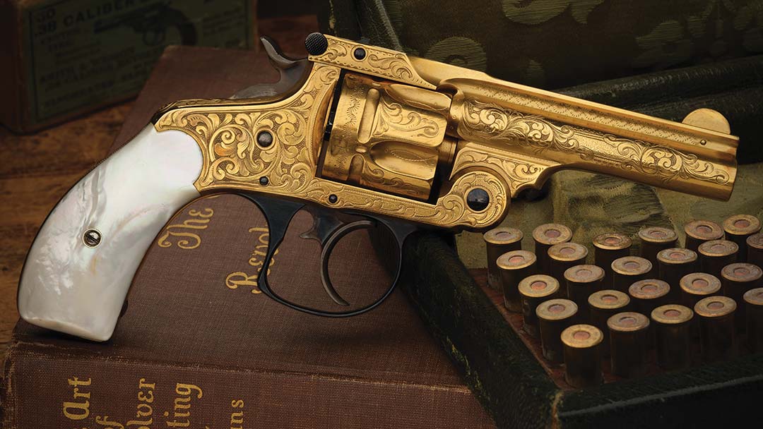 Nimschke-New-York-Deluxe-Engraved-Gold-Plated-Smith---Wesson-38-Double-Action-Revolver-with-Relief-Carved-Pearl-Grips