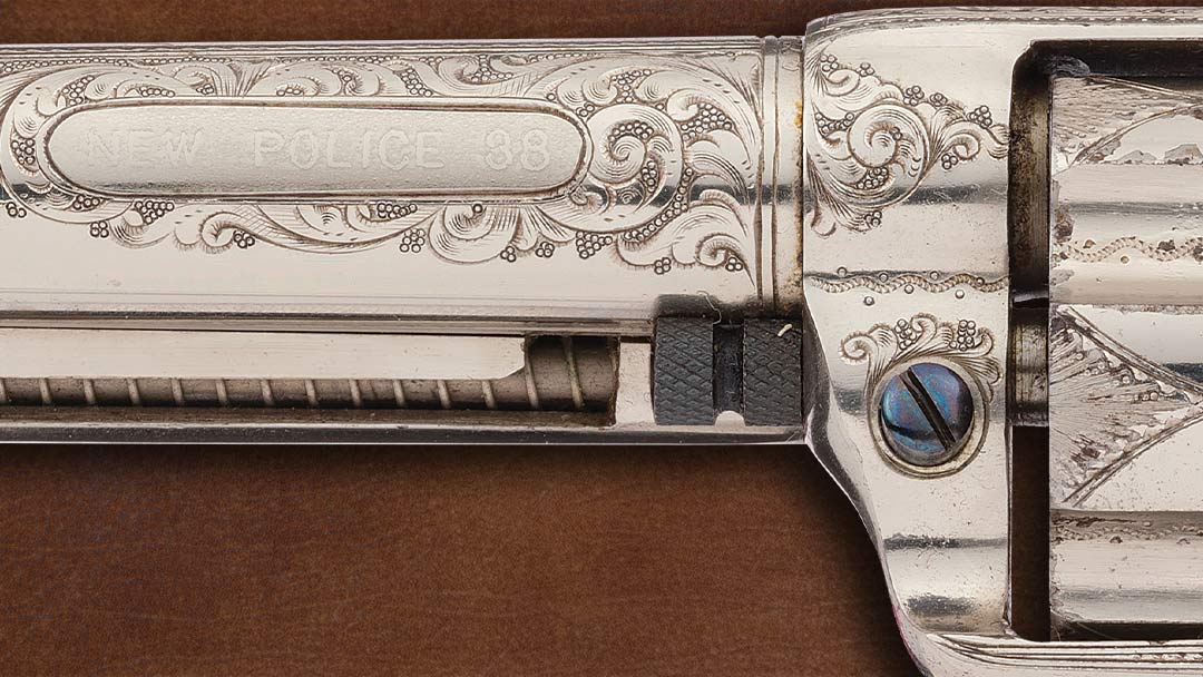 helfricht-engraved-colt-new-police-cop-thug-model-revolver-close-up-left-side-barrel
