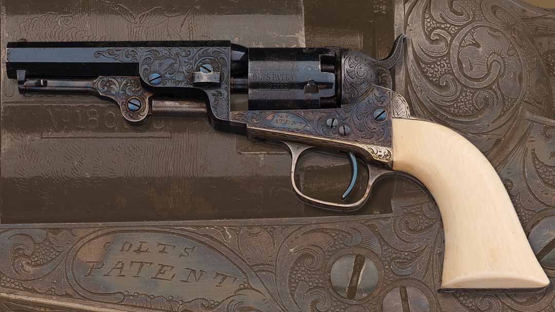 lot-275-cased-factory-engraved-Colt-1849