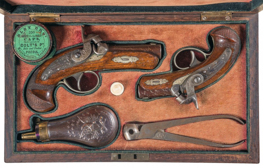 Outstanding Presentation Cased Set of Philadelphia Deringer Percussion Pistols with Accessories The pistol on the left is the exact model used by Booth to assassinate President Lincoln.