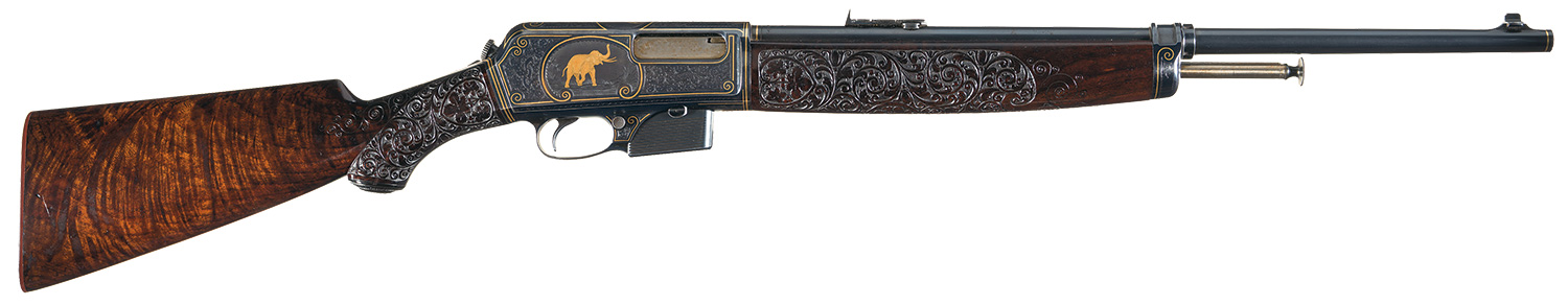 Magnificent John Ulrich Signed Factory Engraved and Big Game Gold Inlaid Winchester Model 1910 Self-Loading Rifle