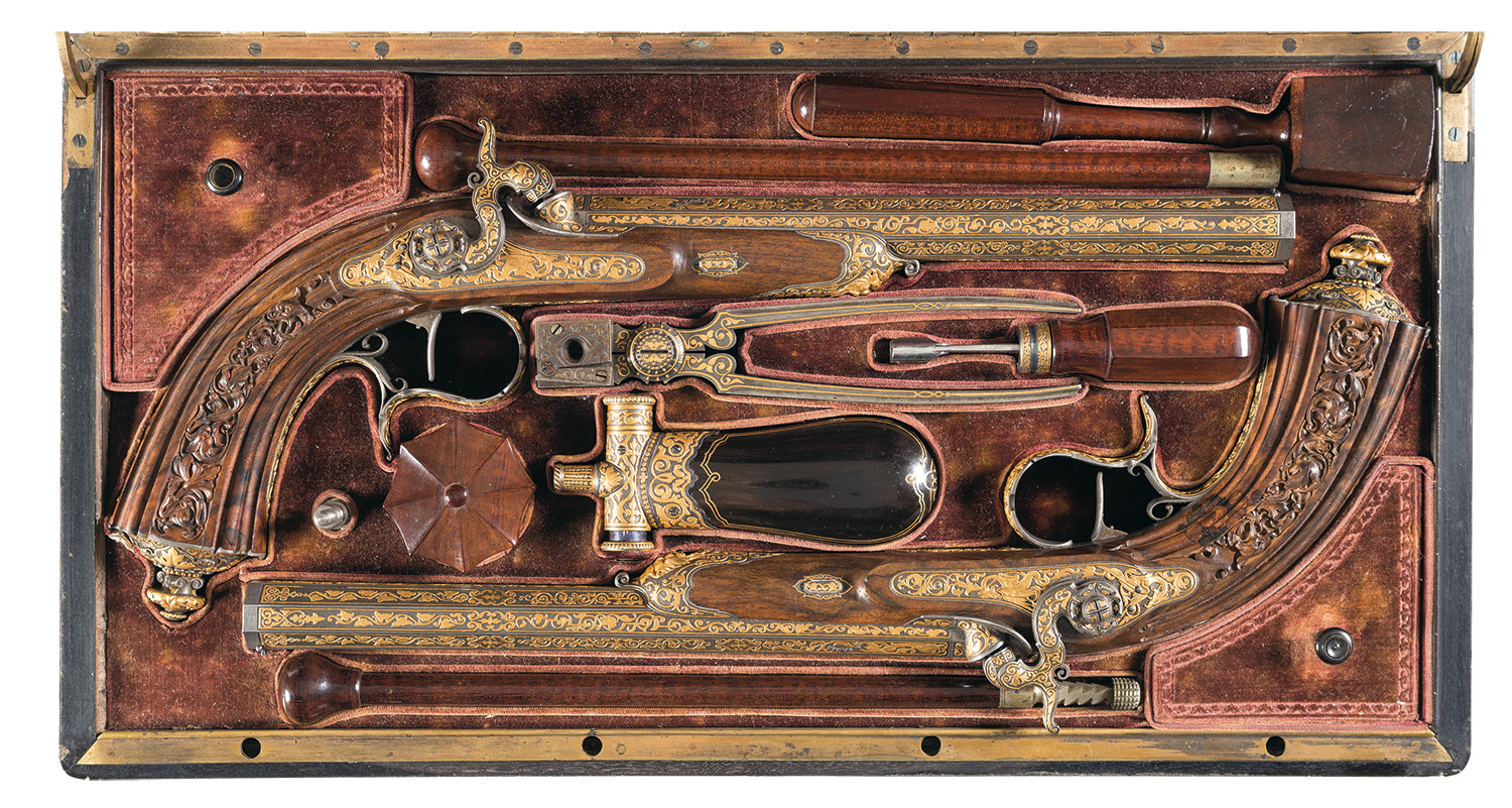 Royal Cased Pair of Lavishly Gold Inlaid Percussion Pistols 