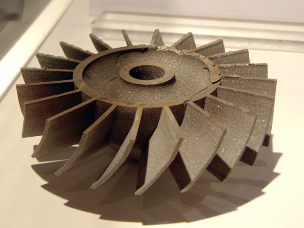 This impeller is printed from titanium alloy.