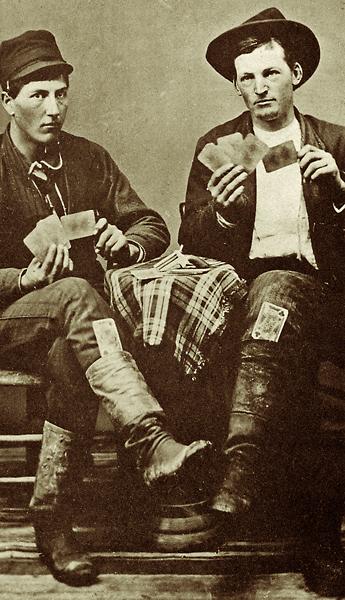 19th century gamblers with a Sharps pepperbox between them. 